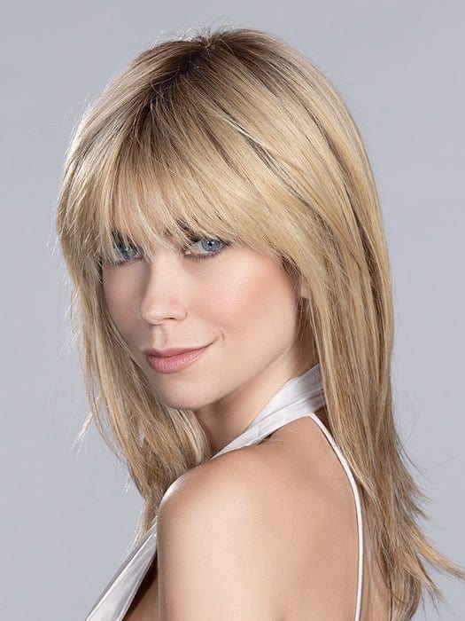 VOICE by Ellen Wille in SAHARA BEIGE ROOTED 26.20.25 | Light Golden Blonde, Light Strawberry Blonde, and Lightest Golden Blonde Blend with Shaded Roots | The style pictured has been cut and heat styled