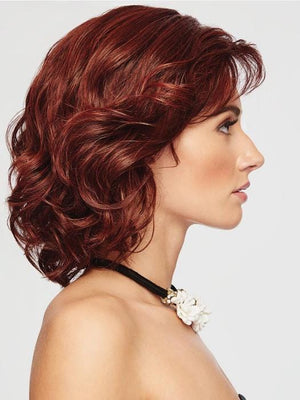 The Raquel Welch Editor's Pick wig is an above the shoulder layered bob, comes styled with loose, bouncy waves