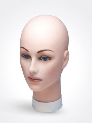 Bald Head Of A Mannequin On A White Background Stock Photo