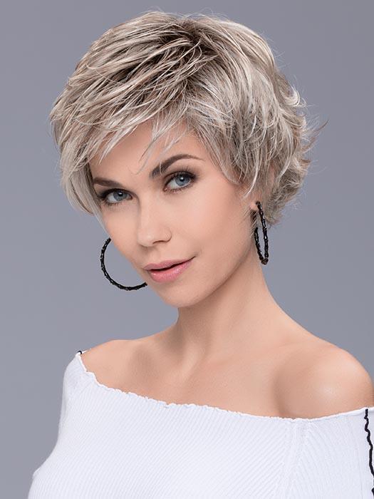 A trendy, playful shag cut with flipped out layers