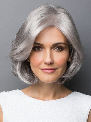 This style is a long bob cut with layers around the face for a flattering and natural look