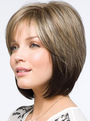 A swingy chin length angled bob with side swept fringe creates a simply beautiful look